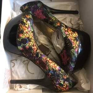 Floral Carlos Santana platform heel.